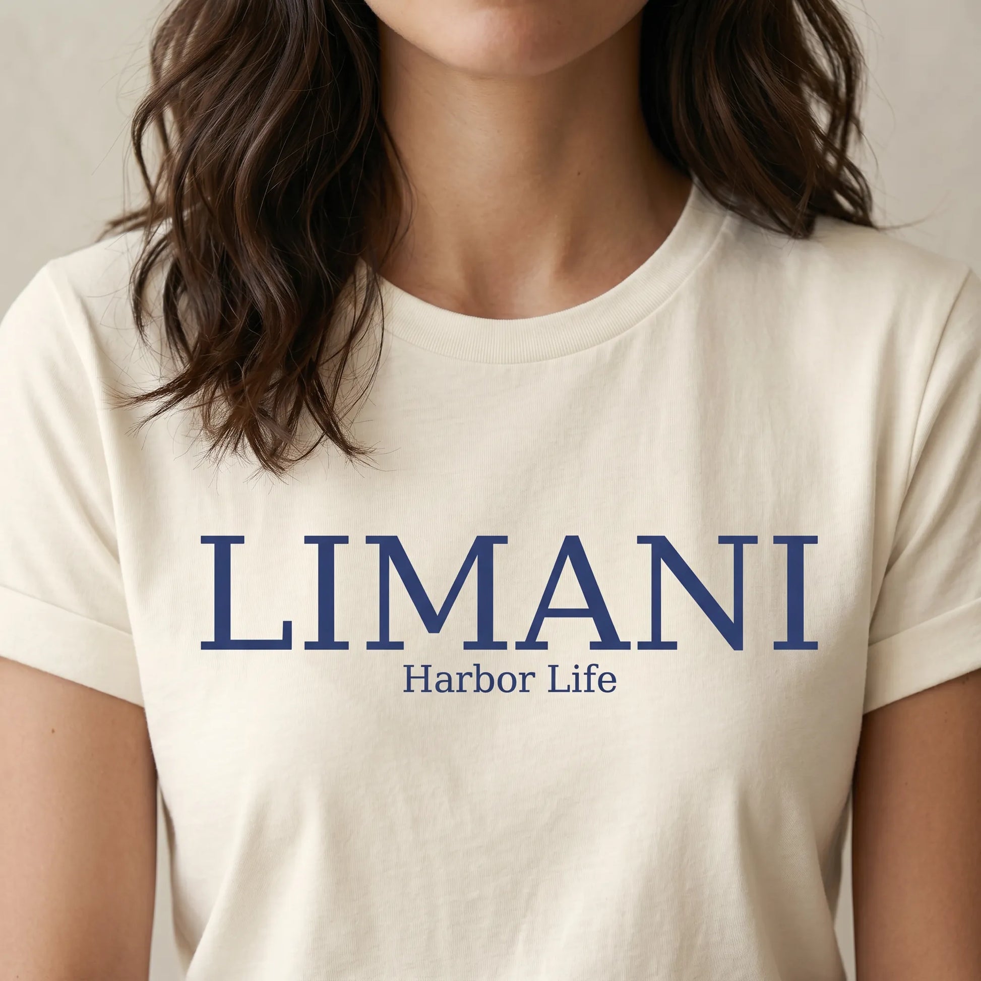 TP HERO: Person wearing a white t-shirt with 'LIMANI Harbor Life' text