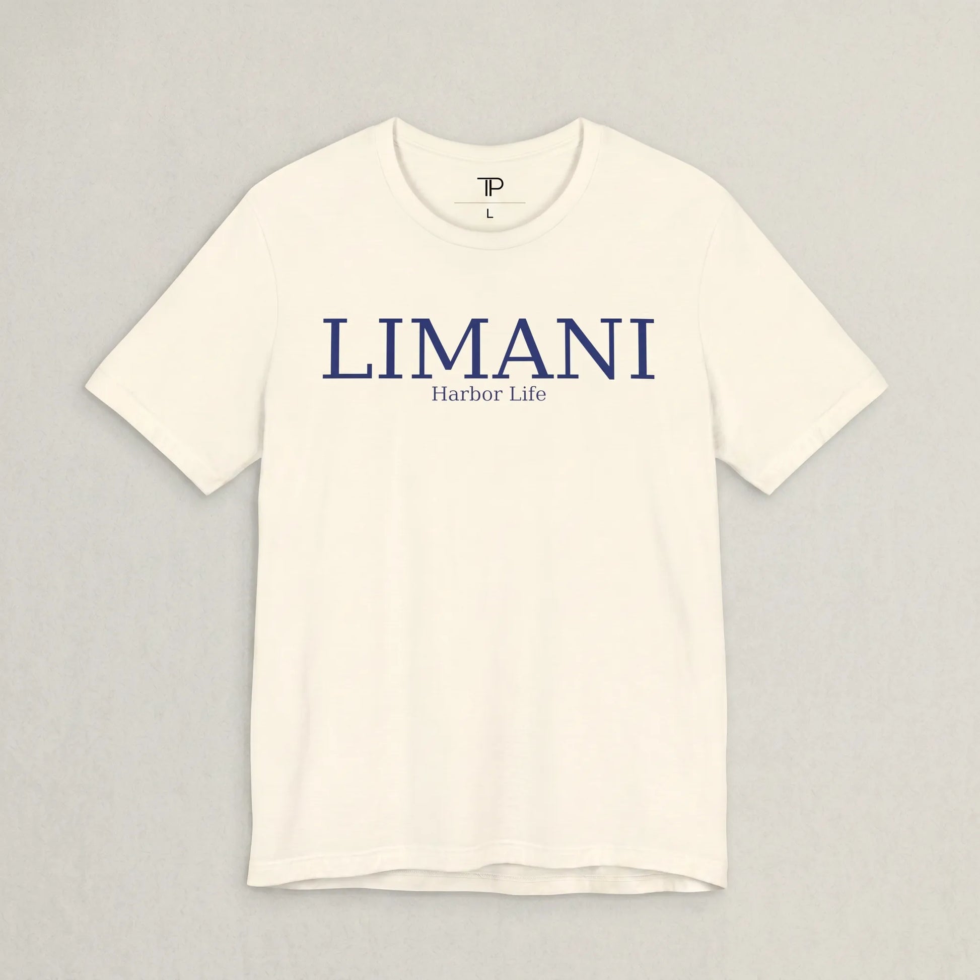 White t-shirt with 'LIMANI' and 'Harbor Life' text on a gray background
