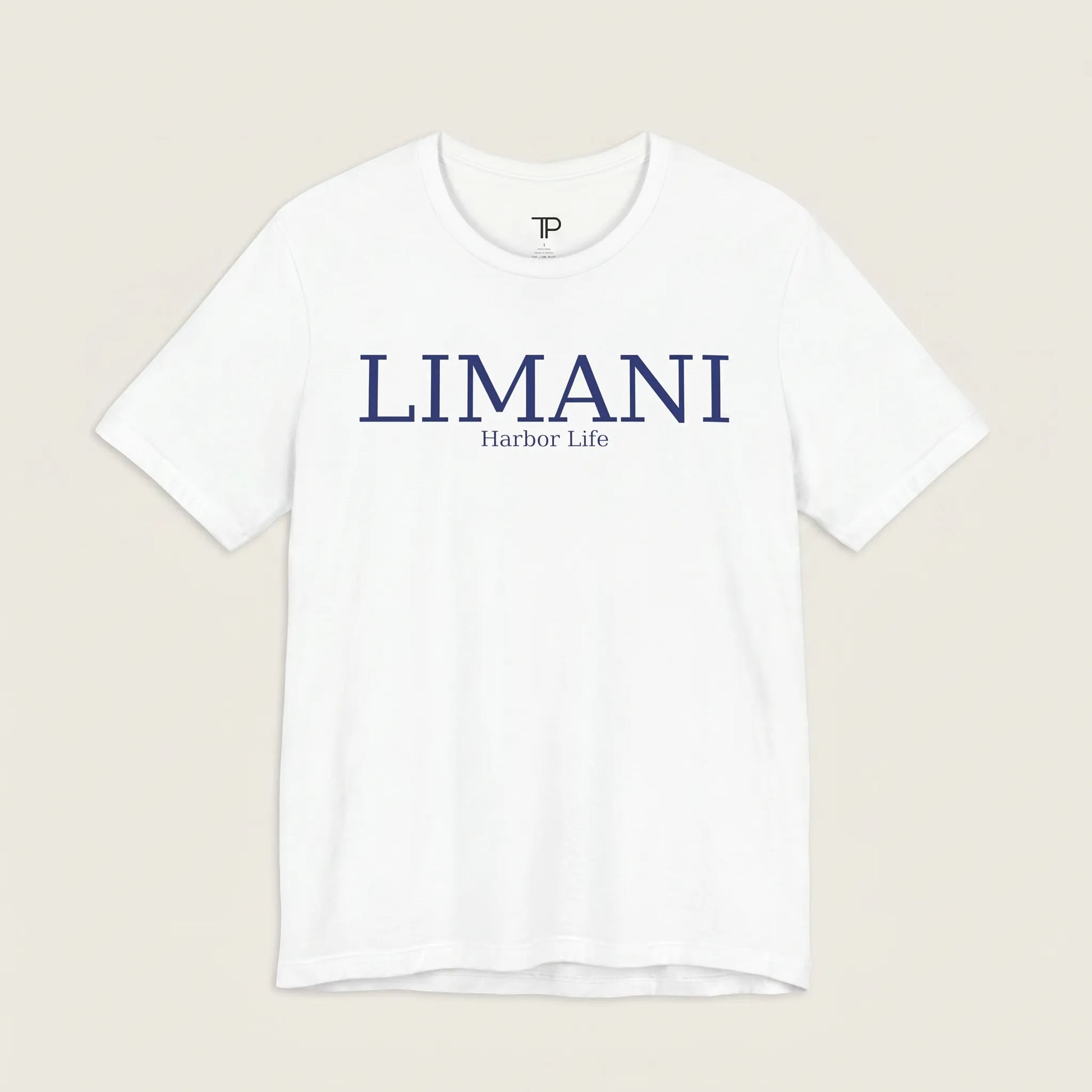 White t-shirt with 'LIMANI' and 'Harbor Life' text on a beige background