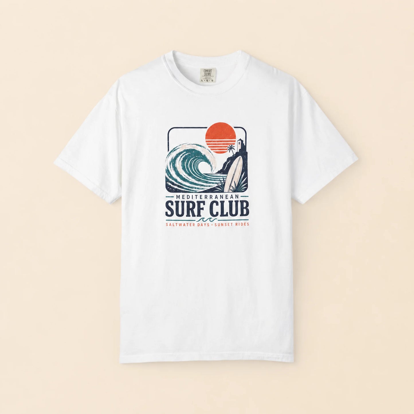White t-shirt with a 'Surf Club' graphic design on a beige background