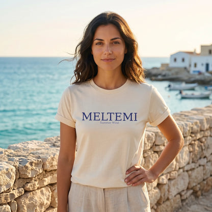 Woman wearing a 'MELTEMI' t-shirt by the sea