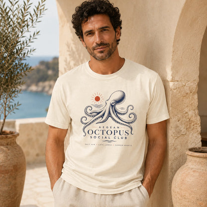 Man wearing a 'Kreteran Octopus Social Club' t-shirt in a scenic outdoor setting.