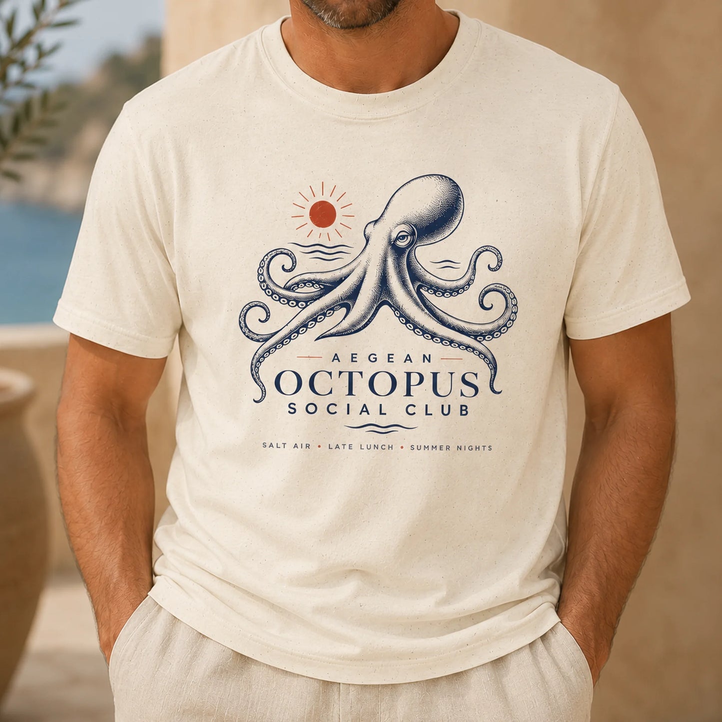 TP HERO: Person wearing a t-shirt with an octopus design and text in a casual setting.