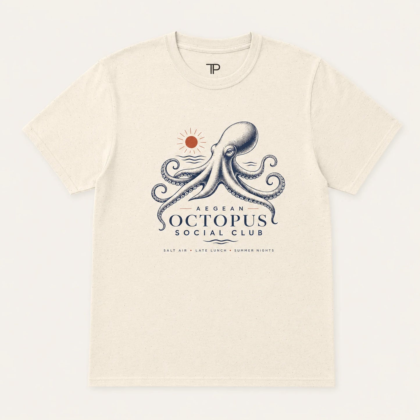 Beige t-shirt with octopus design and text on a white background