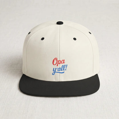 White and black cap with 'Opa y'all!' text on a light gray background