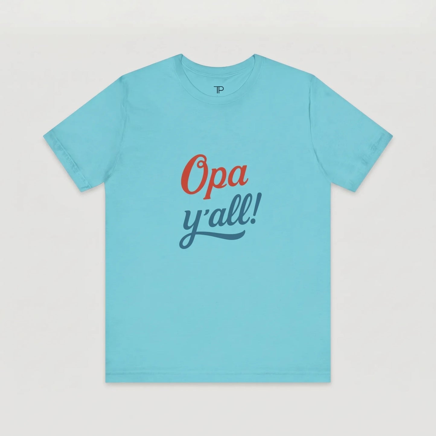 Light blue t-shirt with 'Opa y'all!' text on a light gray background
