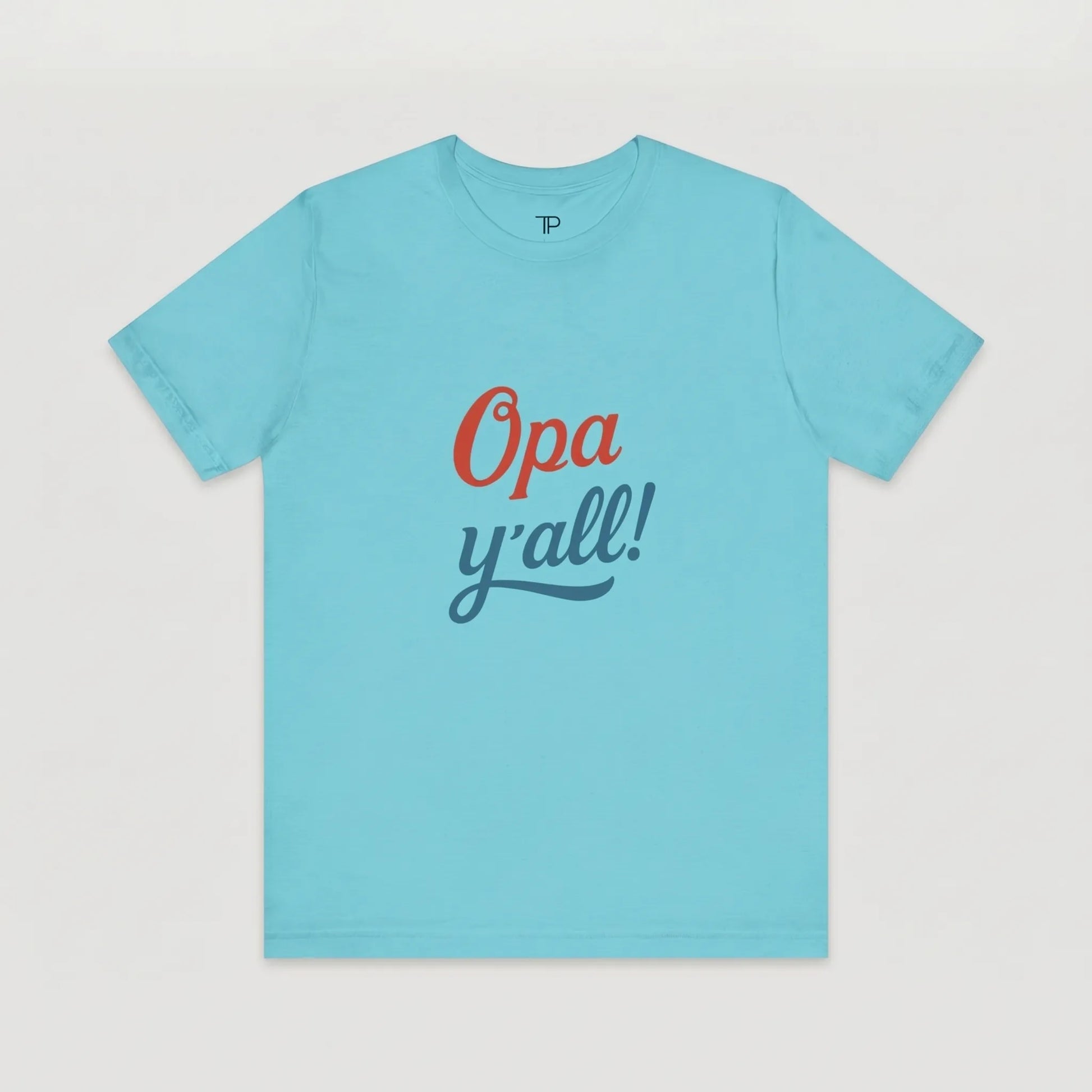 Light blue t-shirt with 'Opa y'all!' text on a light gray background