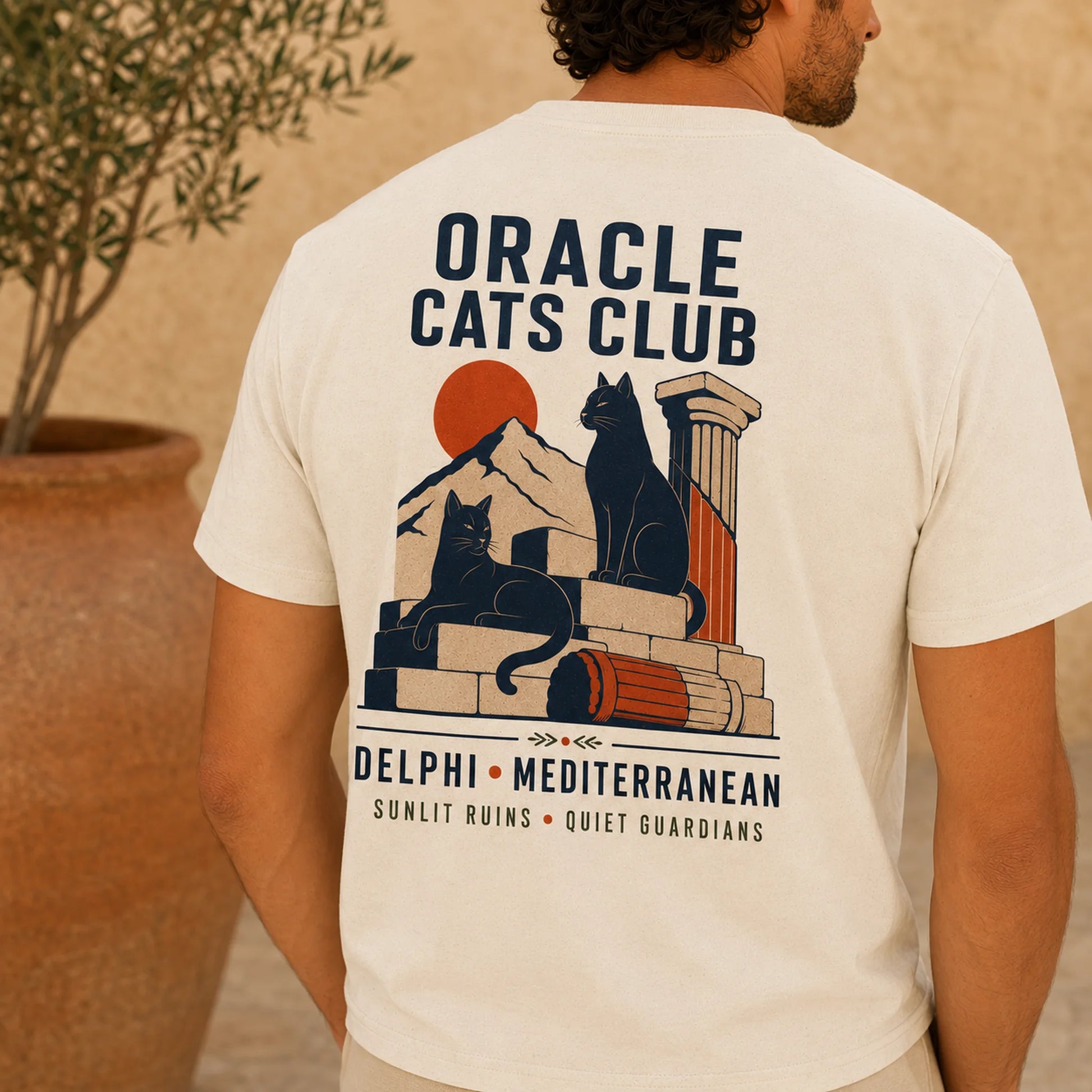 TP HERO: Man wearing Oracle Cats Club tee