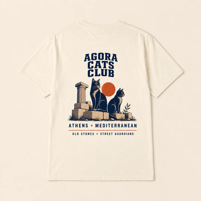 T-shirt with 'Agora Cats Club' design featuring cats and ancient columns on a beige background