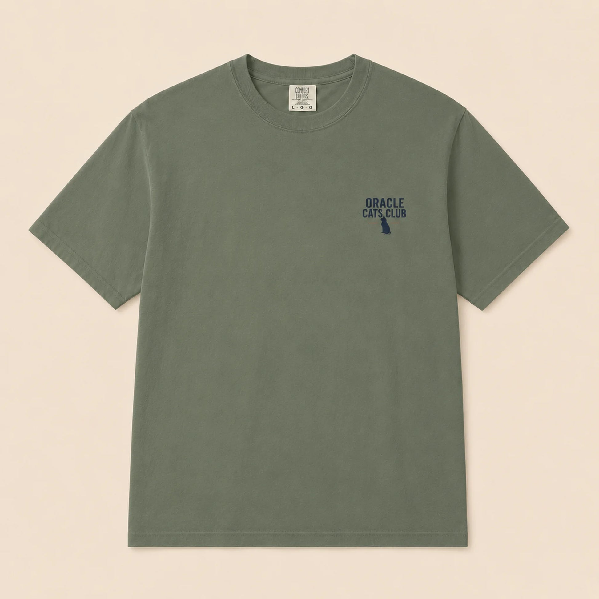 Green t-shirt with a small logo on a beige background