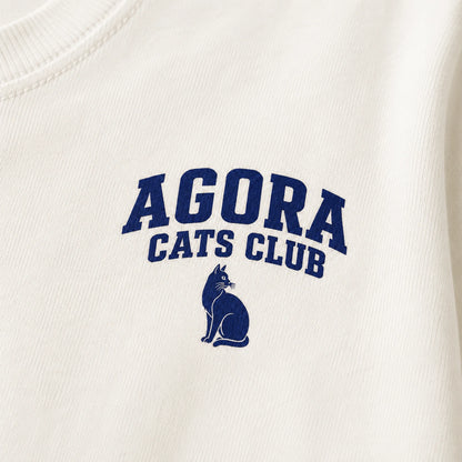 White sweatshirt with 'Agora Cats Club' text and cat logo in blue.