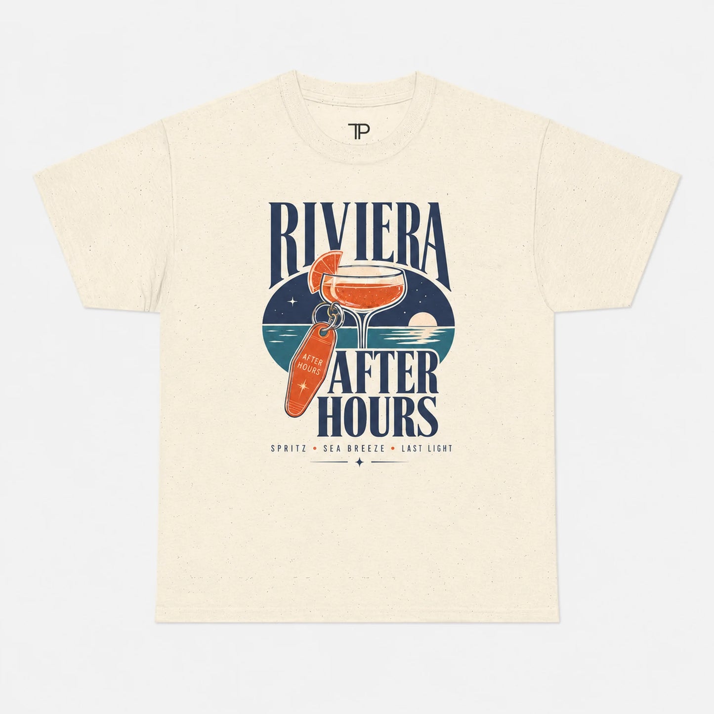 An off-white short-sleeve t-shirt with a vintage-style graphic on the front. The graphic features the text 'RIVIERA AFTER HOURS' in dark blue, with a cocktail glass and an orange bottle labeled 'ORANGE' set against a circular navy and teal background.