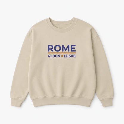A beige crewneck sweatshirt with 'ROME' and geographical coordinates embroidered in blue on the chest, displayed on a clean white background.