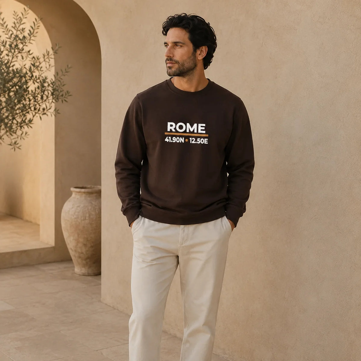 Male model wearing the Dark Chocolate Rome Coordinates Night Embroidered Sweatshirt, showing the embroidered front design.