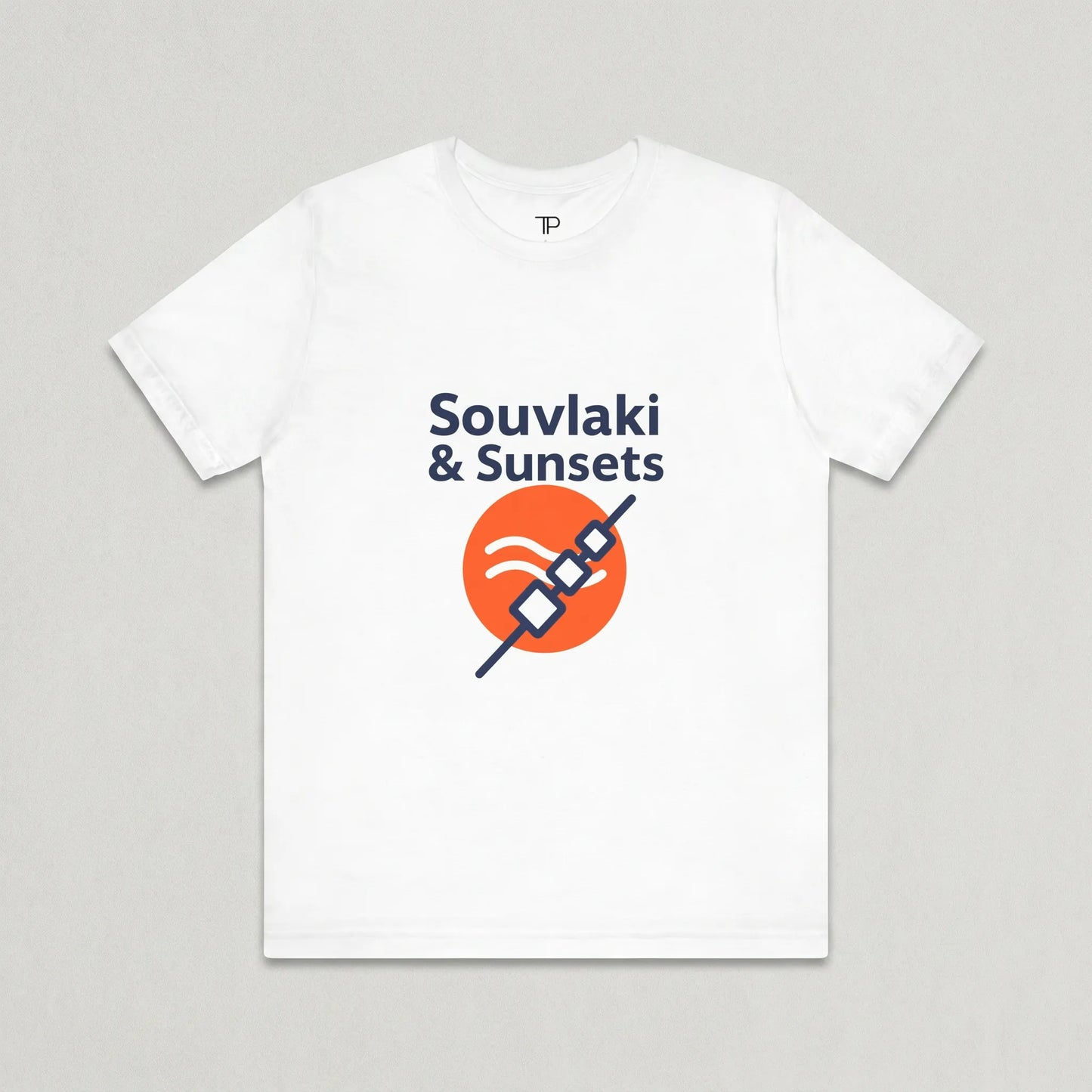White t-shirt with 'Souvlaki & Sunsets' design on a gray background