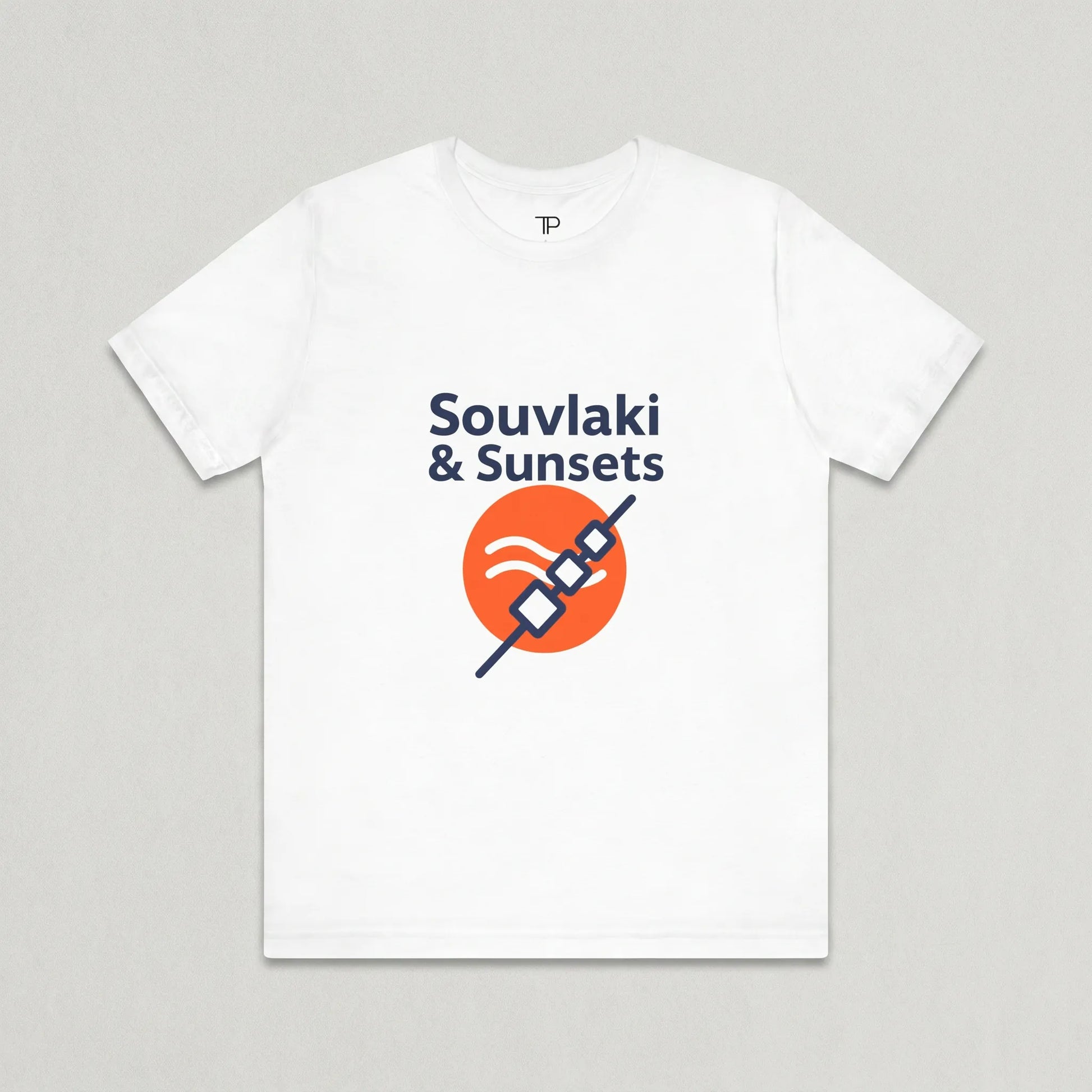 White t-shirt with 'Souvlaki & Sunsets' design on a gray background