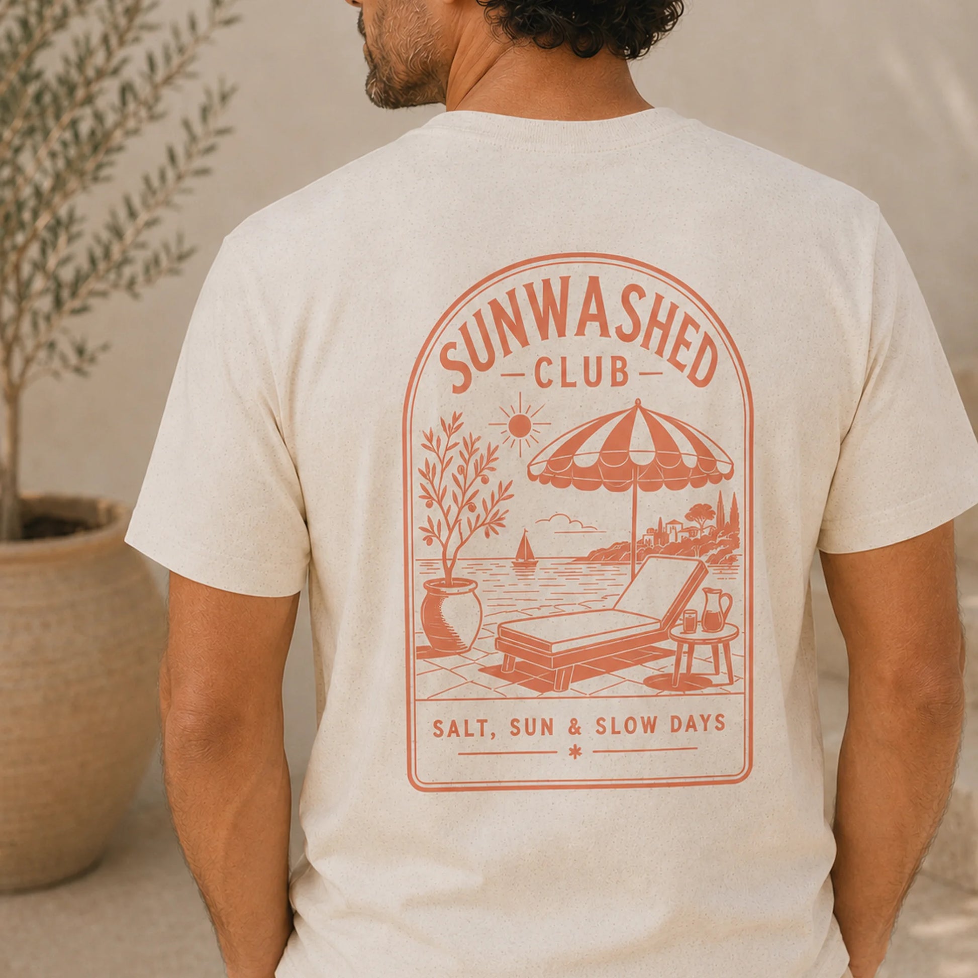 TP HERO: Person wearing a t-shirt with 'Sunwashed Club' design on the back