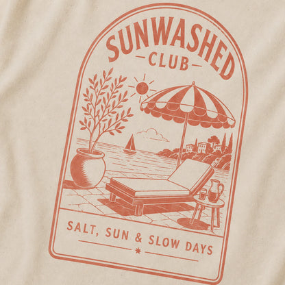 Beige t-shirt with red 'Sunwashed Club' graphic featuring a beach scene.