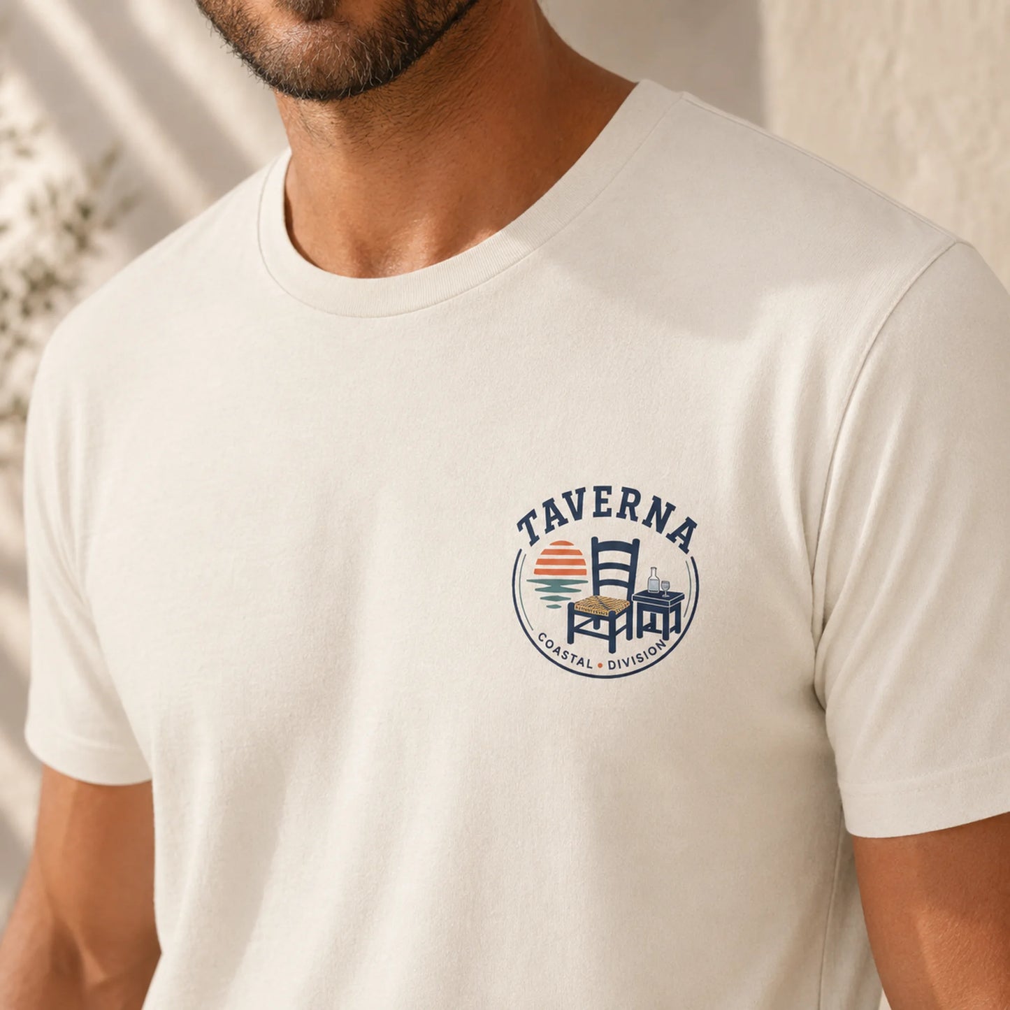 White t-shirt with 'Taverna' logo worn by a person