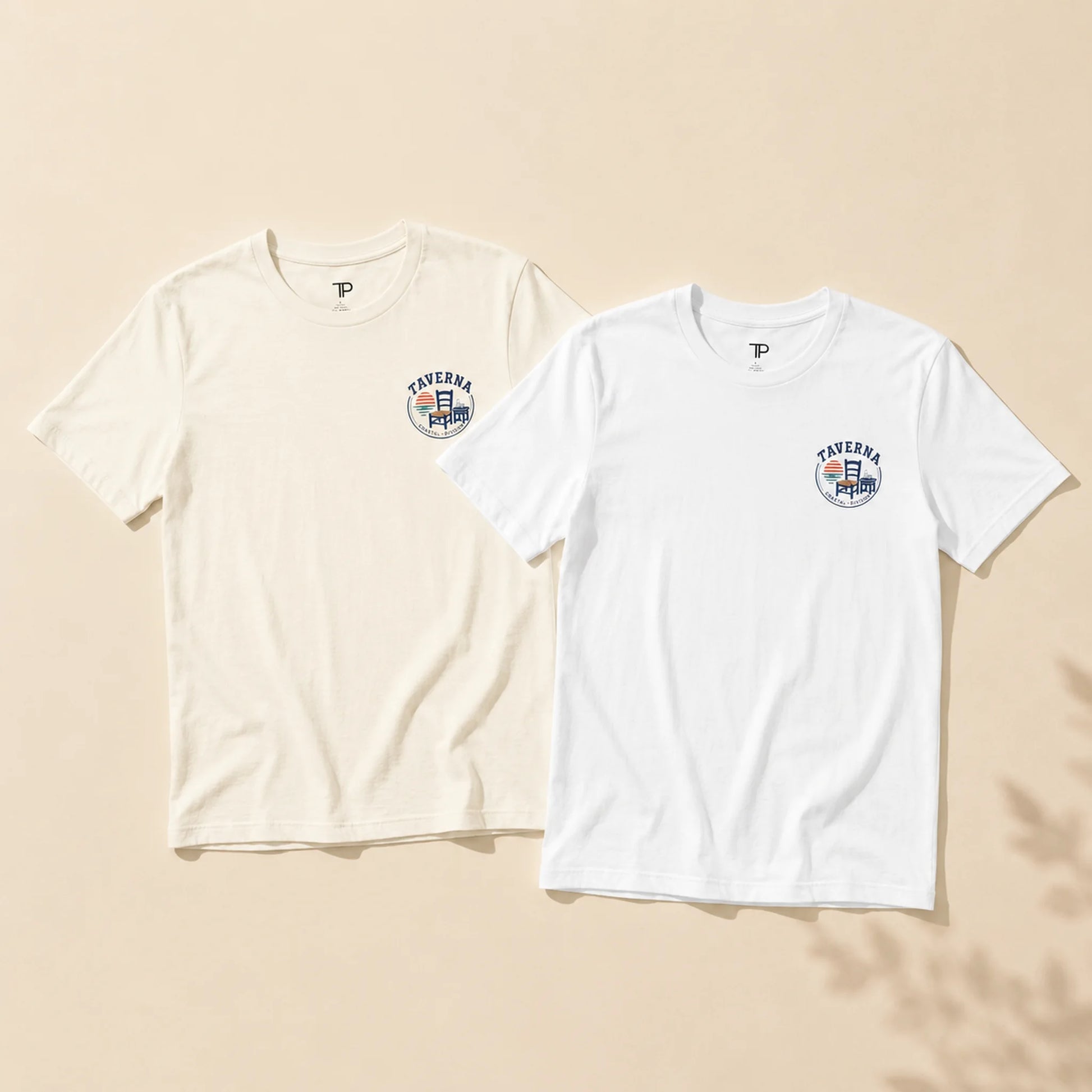 Two white t-shirts with a logo on a beige background