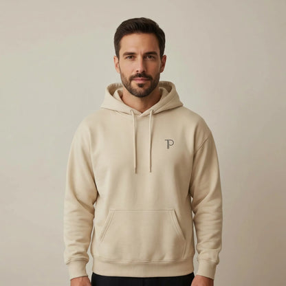 TP:HERO Front view of sand Abstract Muse Face hoodie with small chest monogram and unisex fit