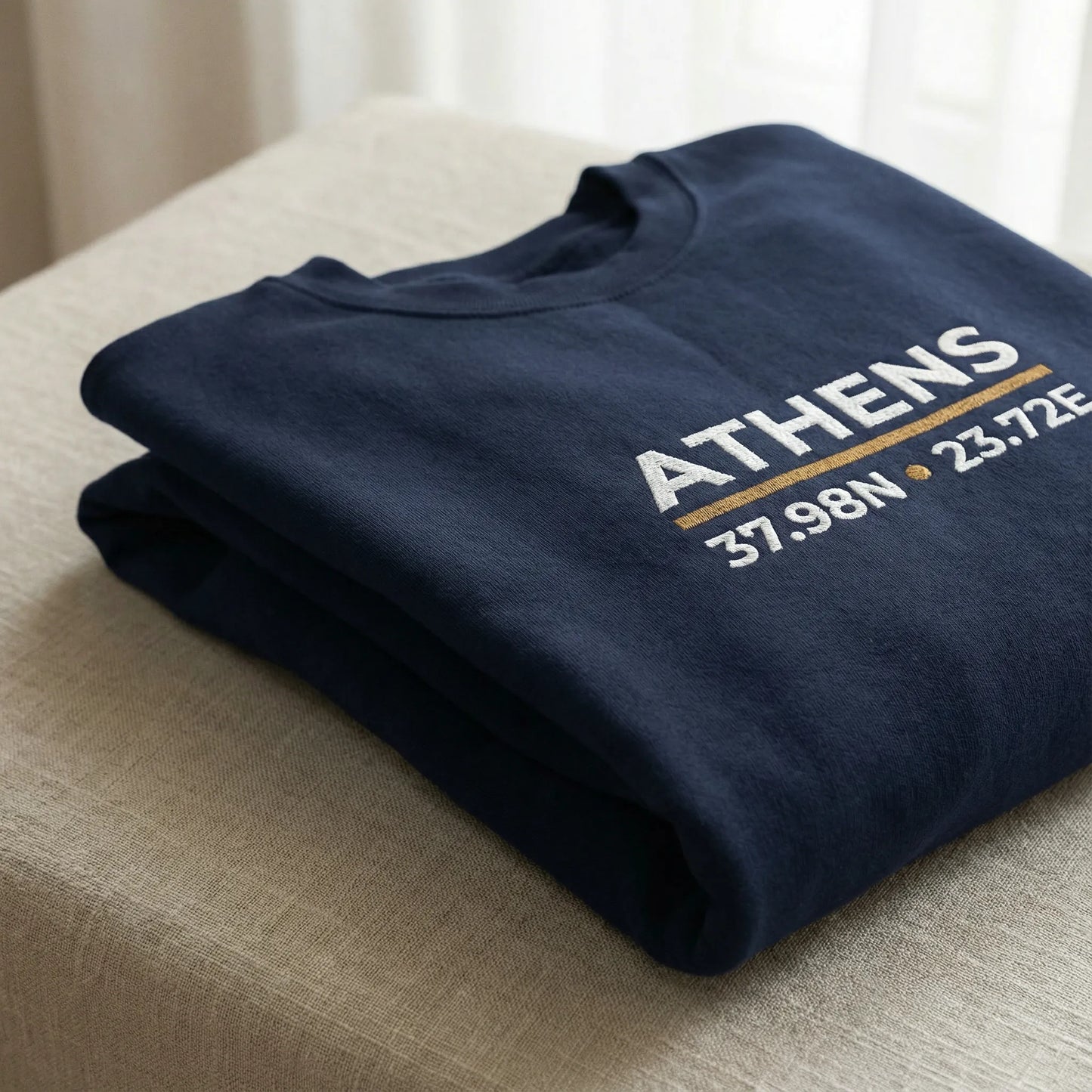 Folded Athens coordinates crewneck sweatshirt showing fabric texture