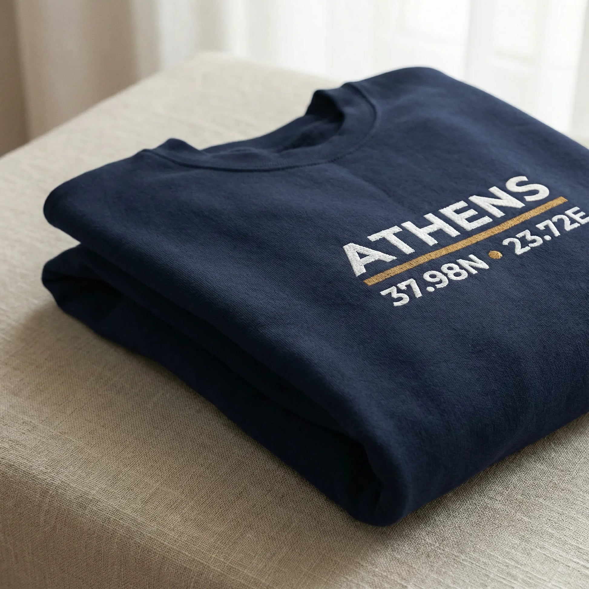 Folded Athens coordinates crewneck sweatshirt showing fabric texture