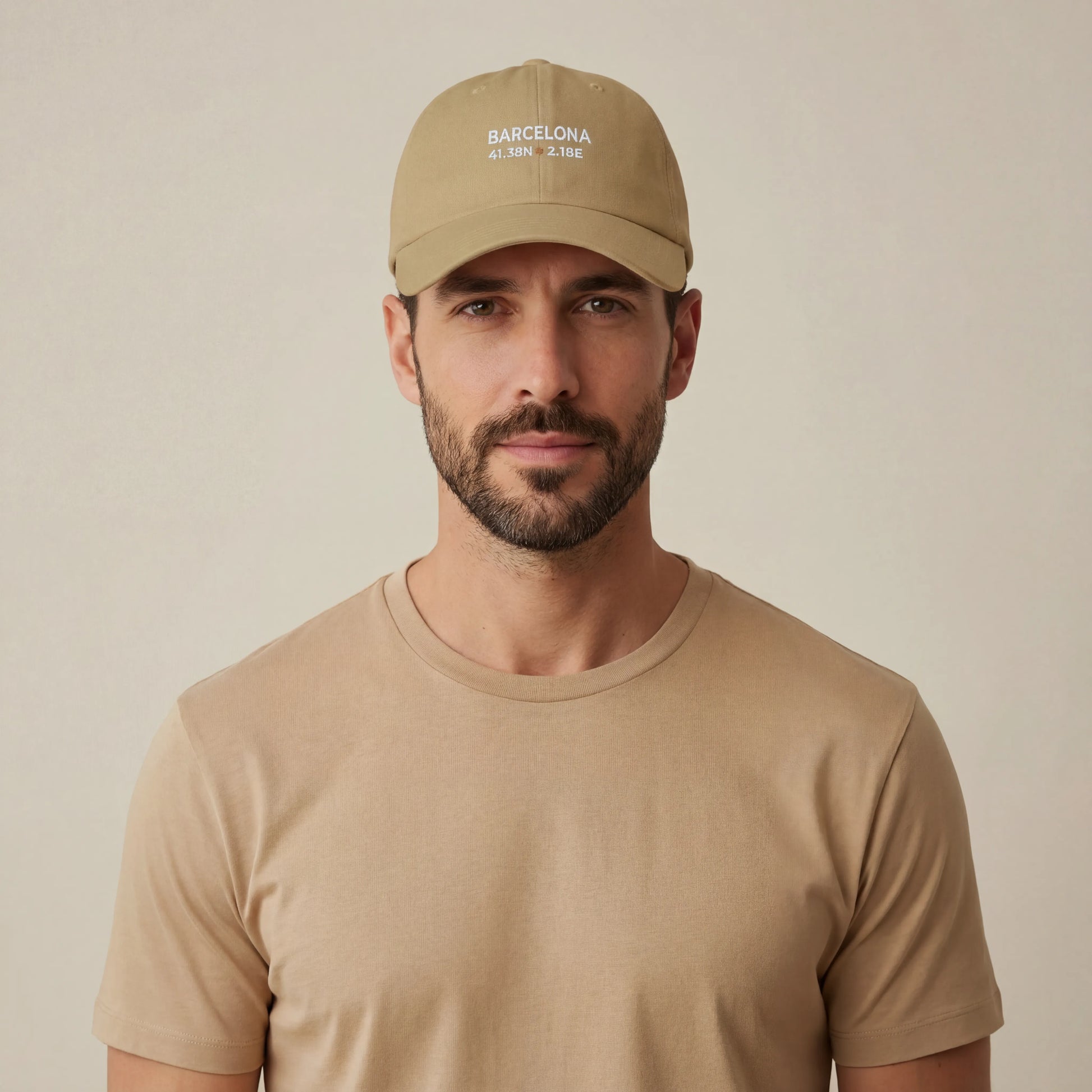 TP:HERO Barcelona coordinates embroidered dad cap worn by male model, front studio view
