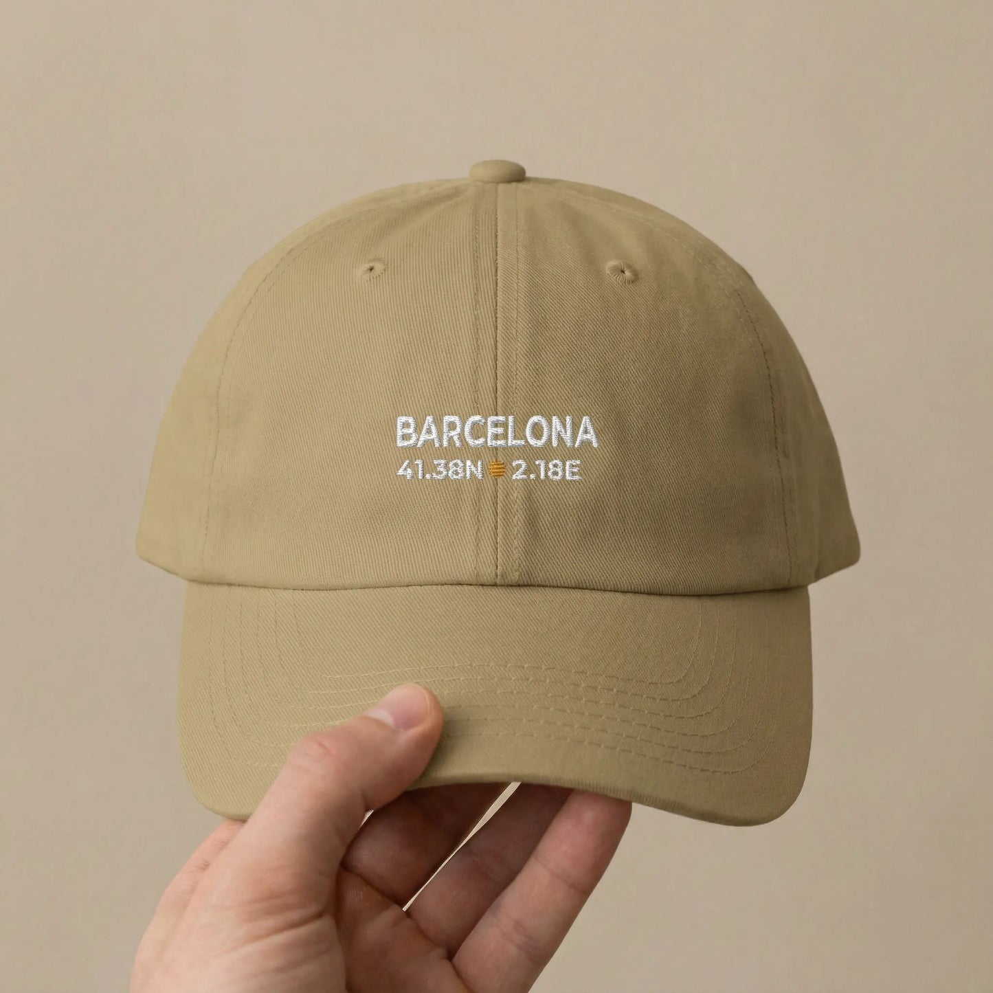 Close-up of Barcelona coordinates embroidery on dad cap