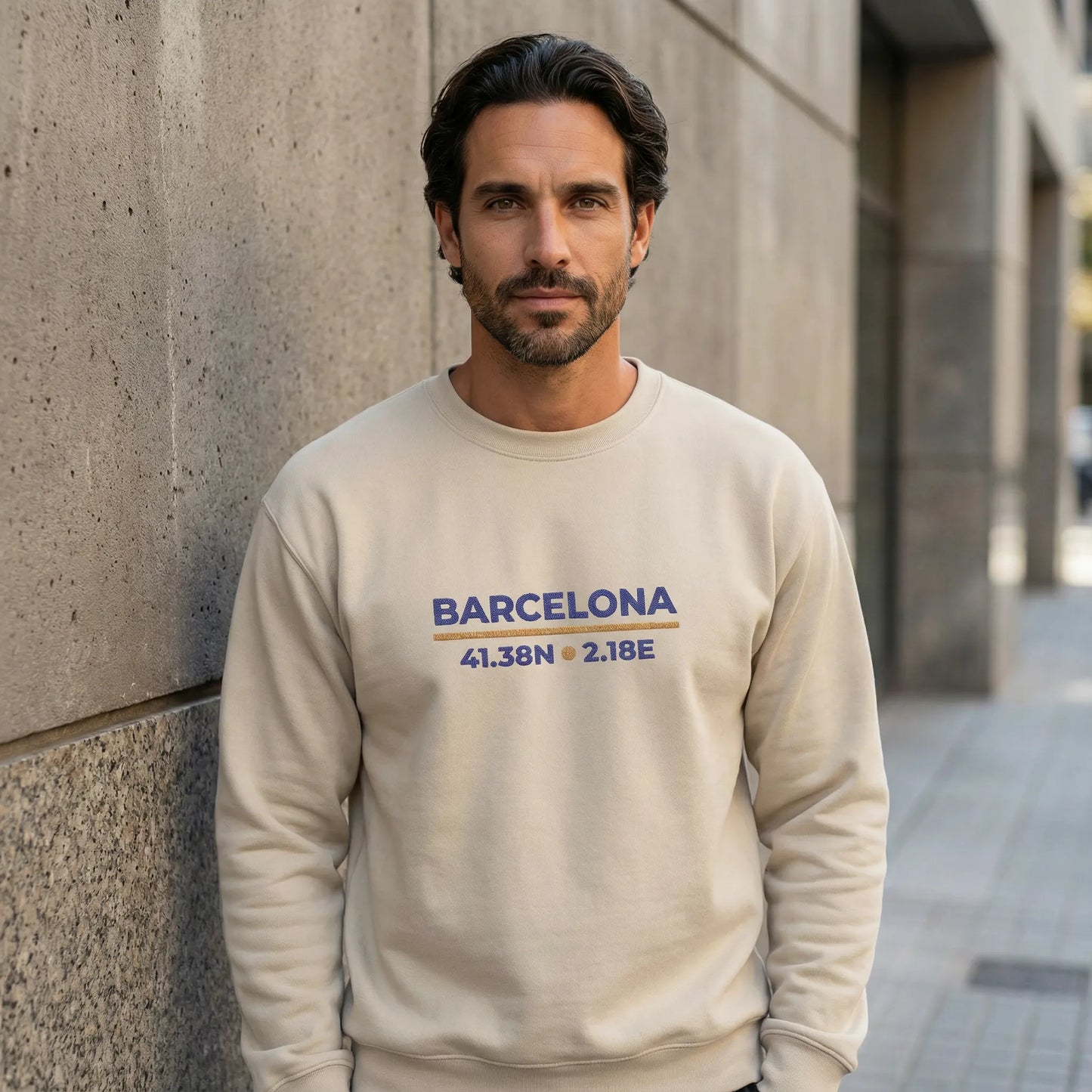 Barcelona coordinates embroidered sweatshirt worn in urban street-style setting