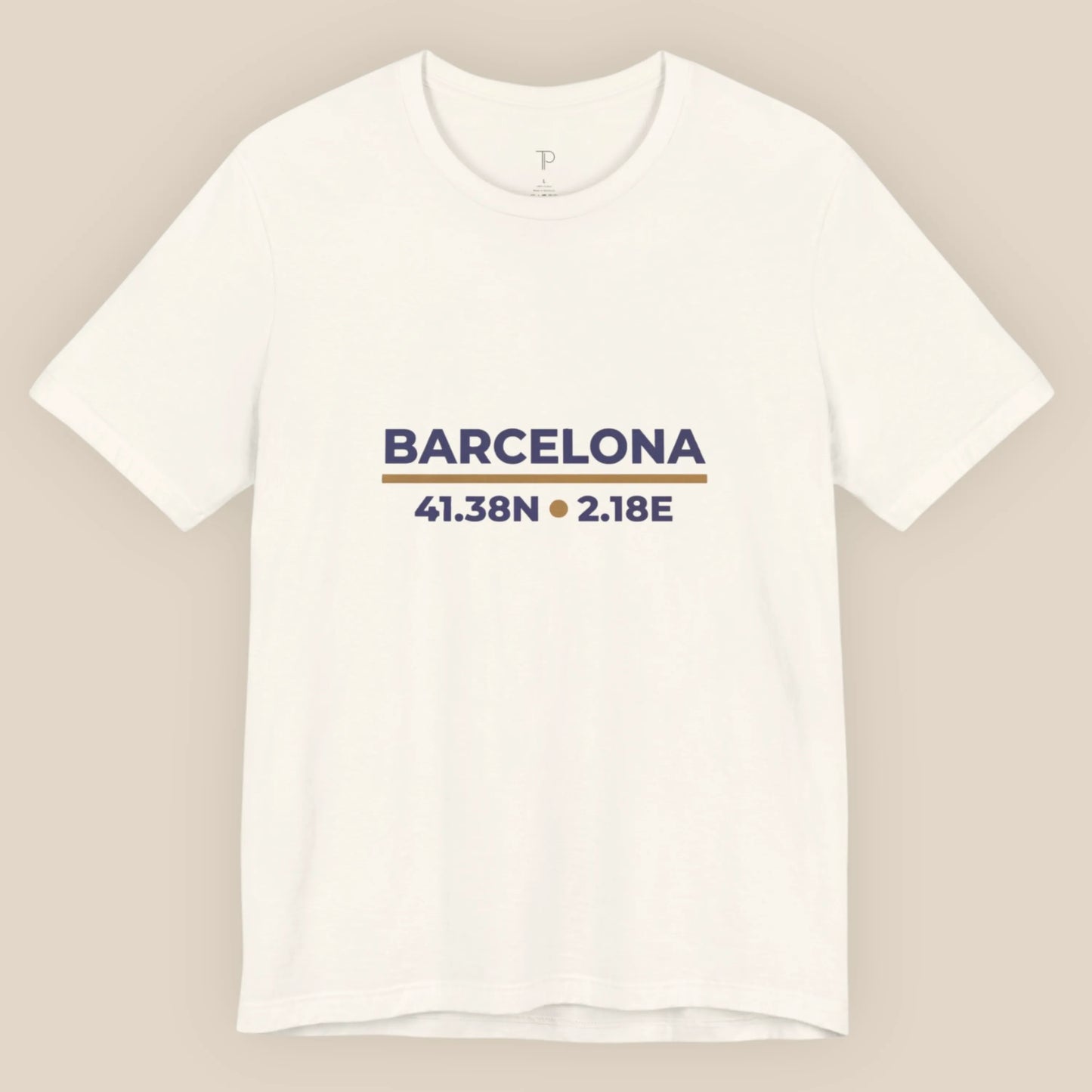 White t-shirt with 'Barcelona' and coordinates printed on a beige background