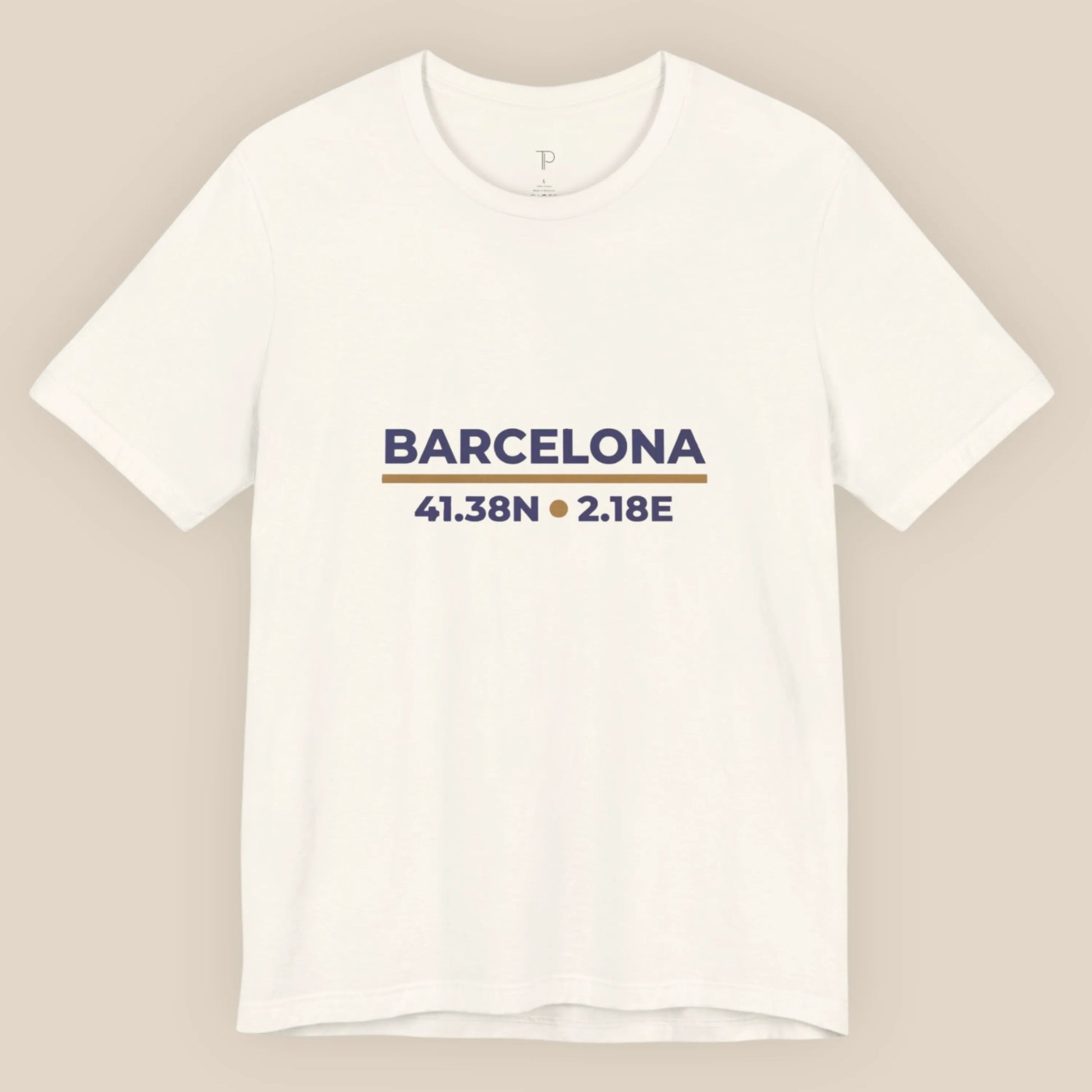 White t-shirt with 'Barcelona' and coordinates printed on a beige background