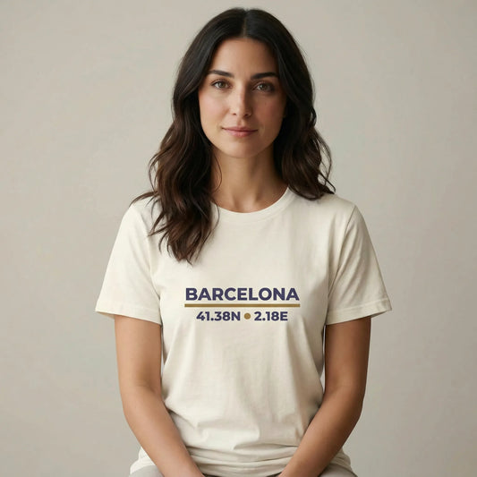 TP:HERO Woman wearing a white t-shirt with 'Barcelona' coordinates on a plain background