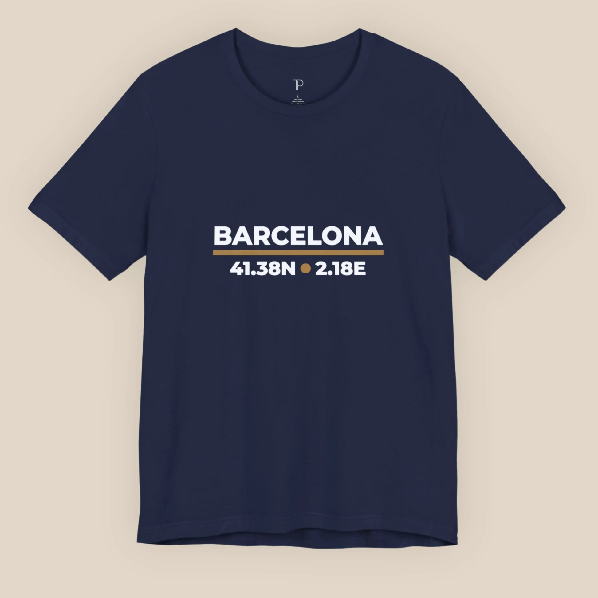 Navy blue t-shirt with 'Barcelona' and coordinates on a beige background
