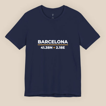 Navy blue t-shirt with 'Barcelona' and coordinates on a beige background