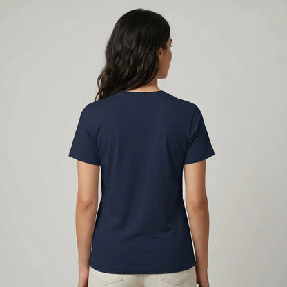 Person wearing a navy blue t-shirt on a plain background