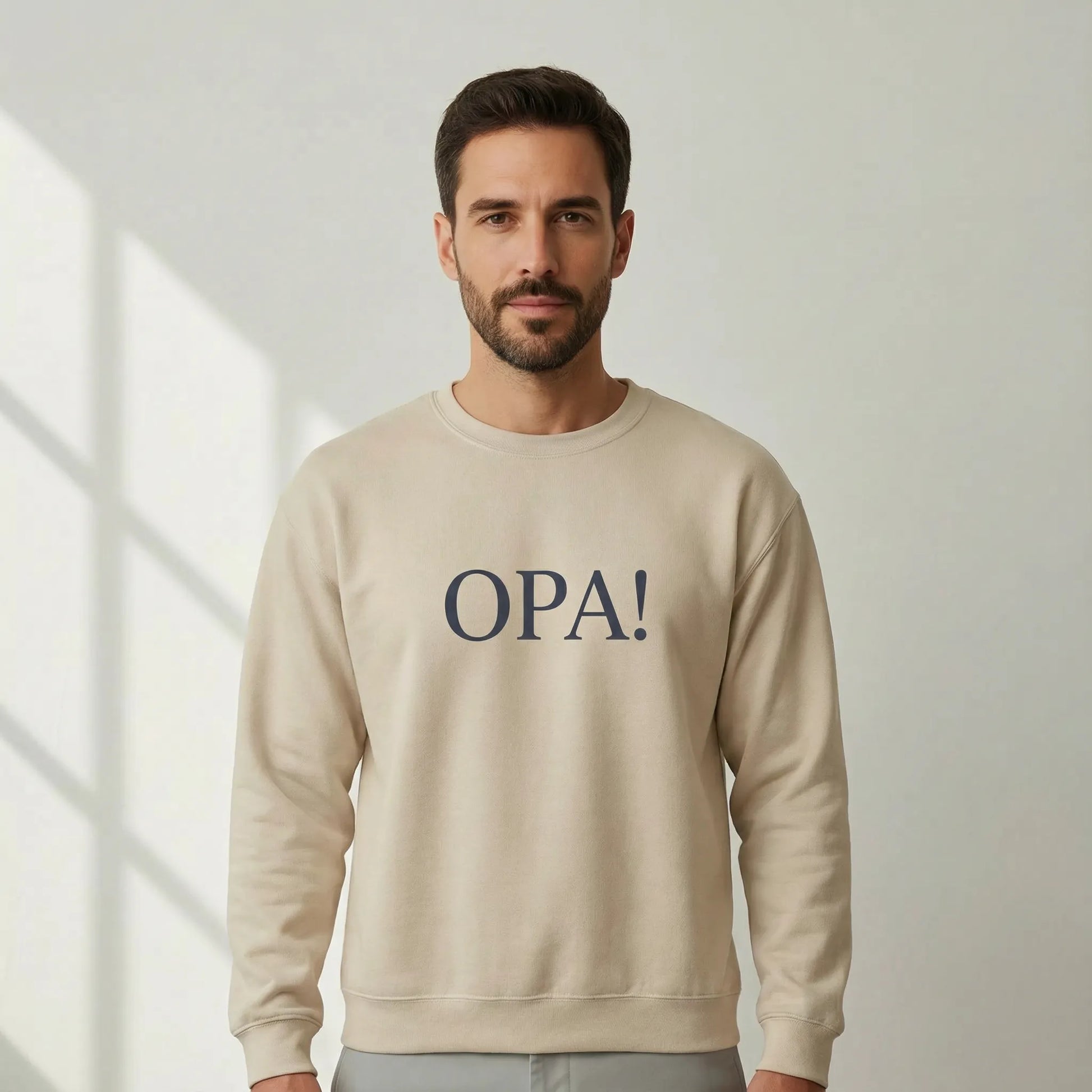 TP:HERO Unisex model wearing sand Celebratory OPA crewneck sweatshirt with Greek typography front print