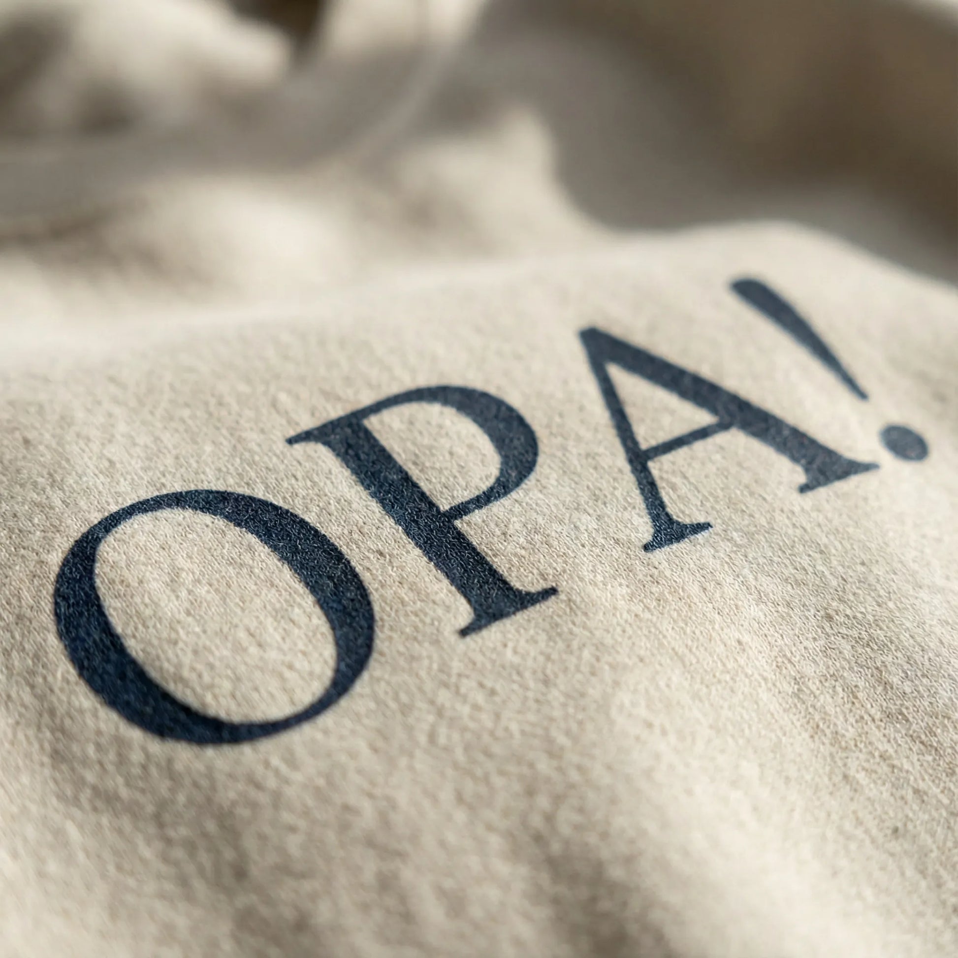 Close-up of OPA Greek typography DTG print on fleece crewneck sweatshirt