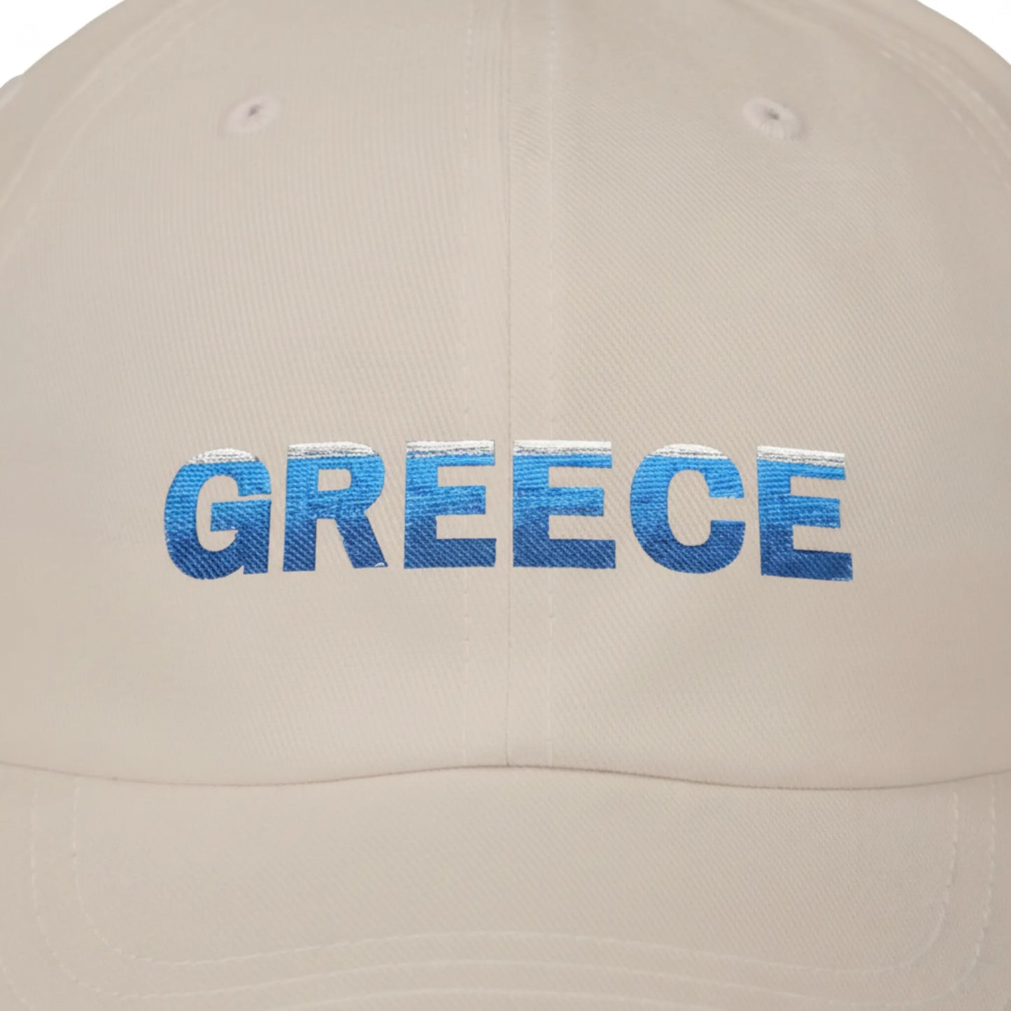 Close-up of Greece embroidery on sand cotton dad cap showing thread detail