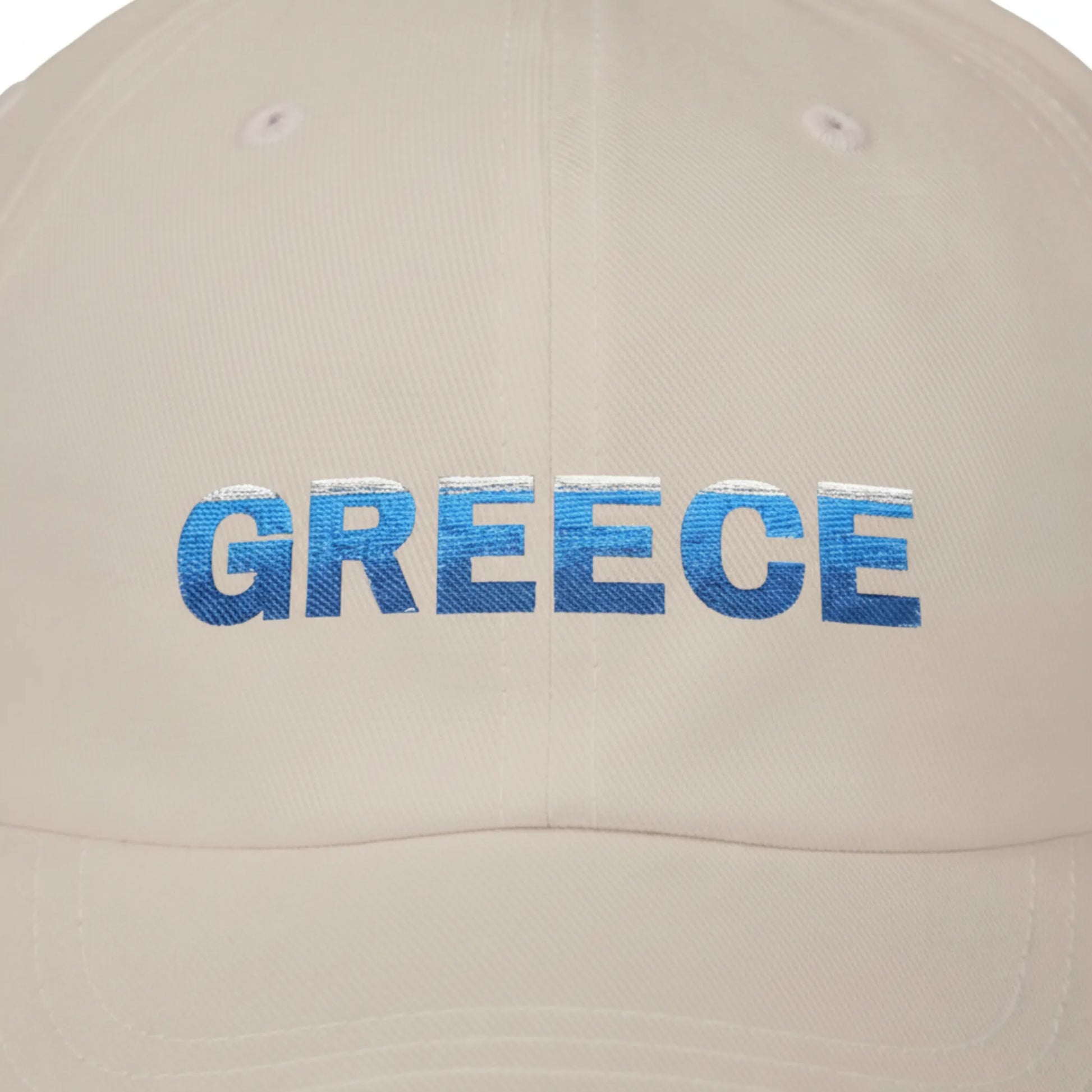 Close-up of Greece embroidery on sand cotton dad cap showing thread detail