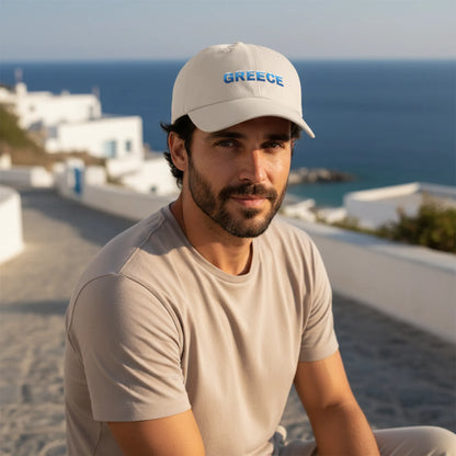 Model wearing sand Greece Classic embroidered dad cap in Mediterranean outdoor travel setting