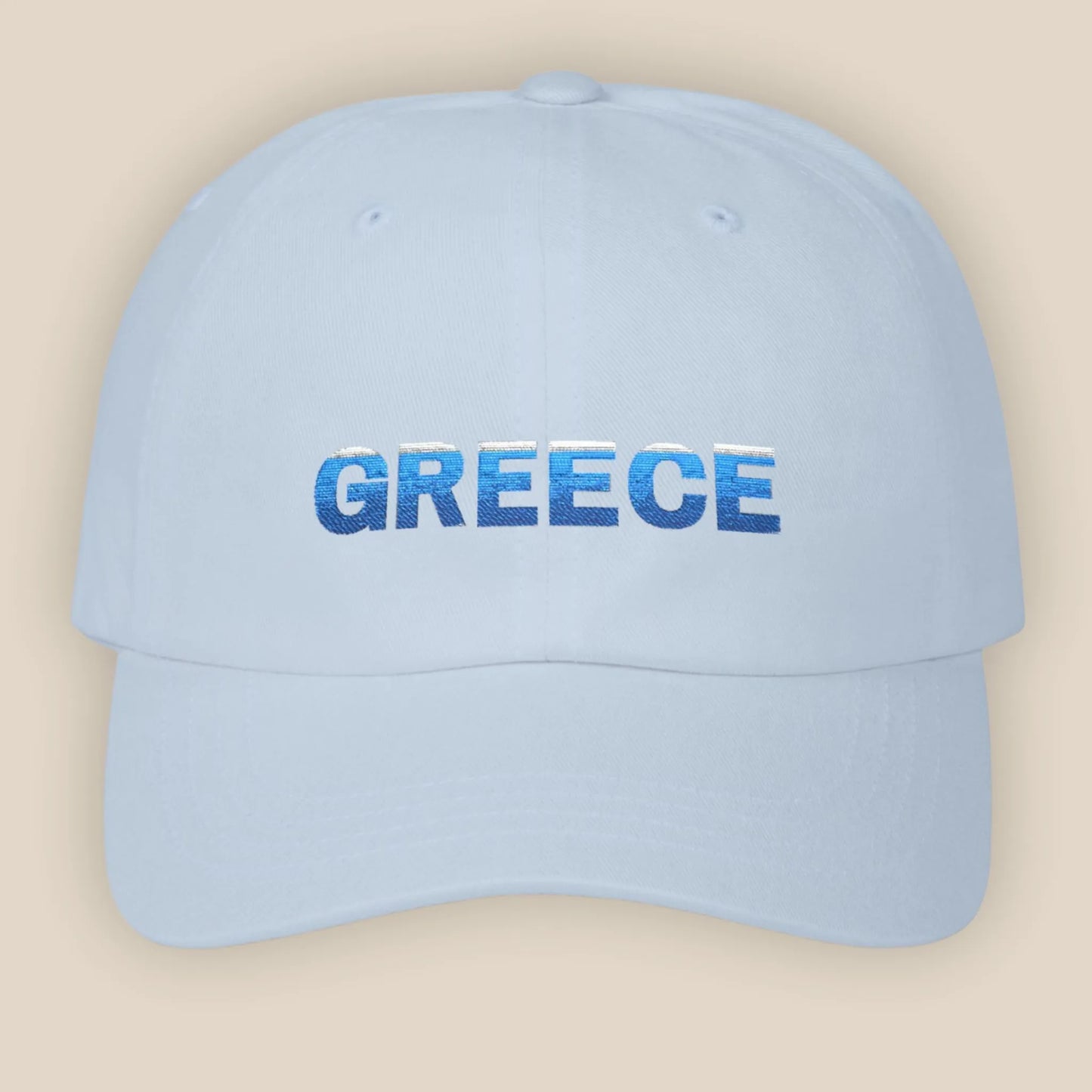 Flat lay of light blue Greece Classic embroidered cotton dad cap showing Greece text on front panel