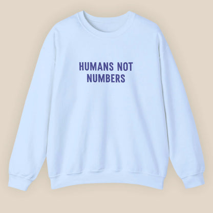 Flat lay of Humans Not Numbers embroidered sweatshirt in light blue
