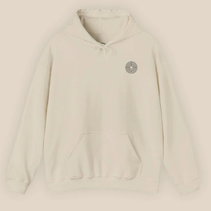 Flat lay of Labyrinth Hoodie in Sand displaying the circular labyrinth print