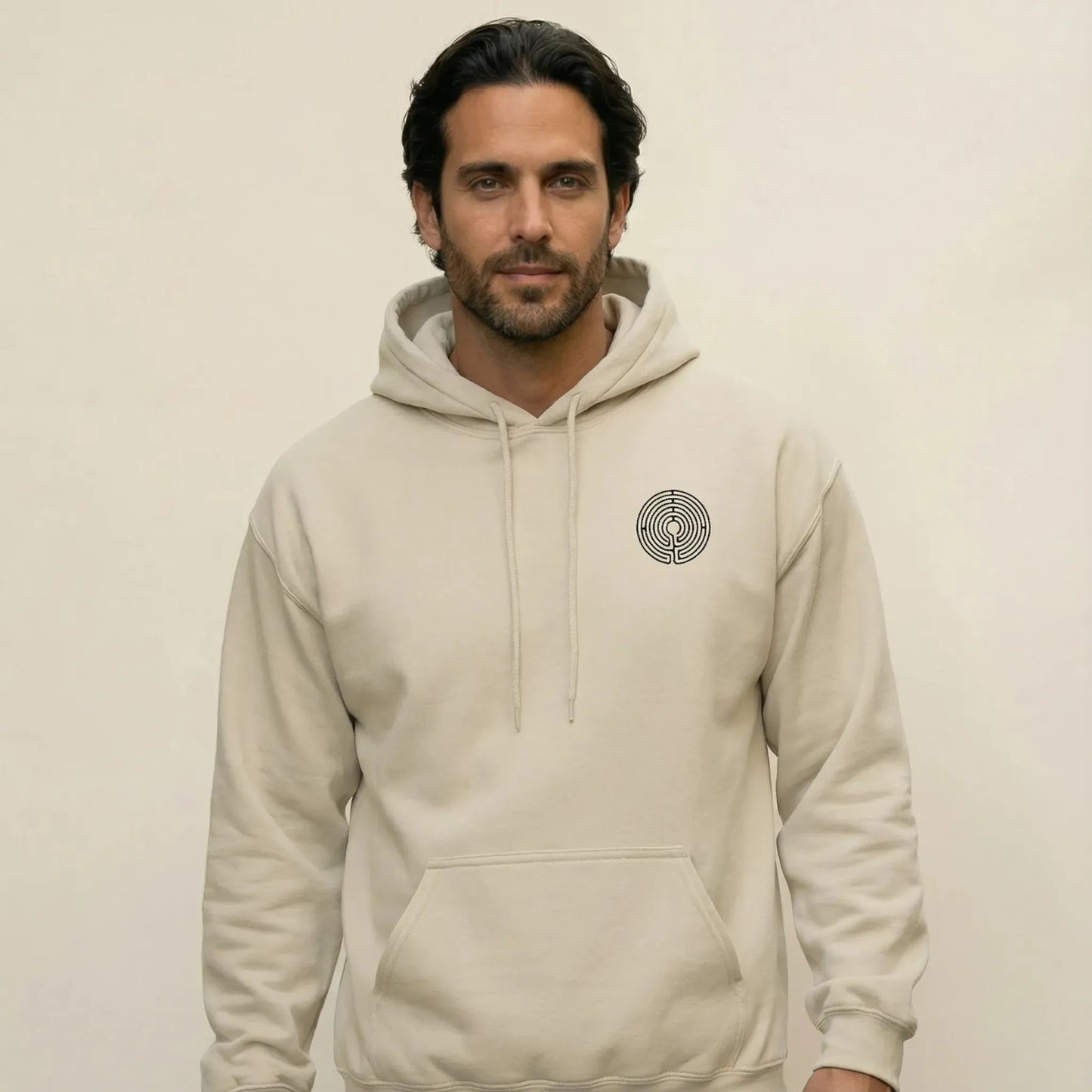 TP:HERO Front view of Labyrinth Hoodie with small circular labyrinth chest glyph