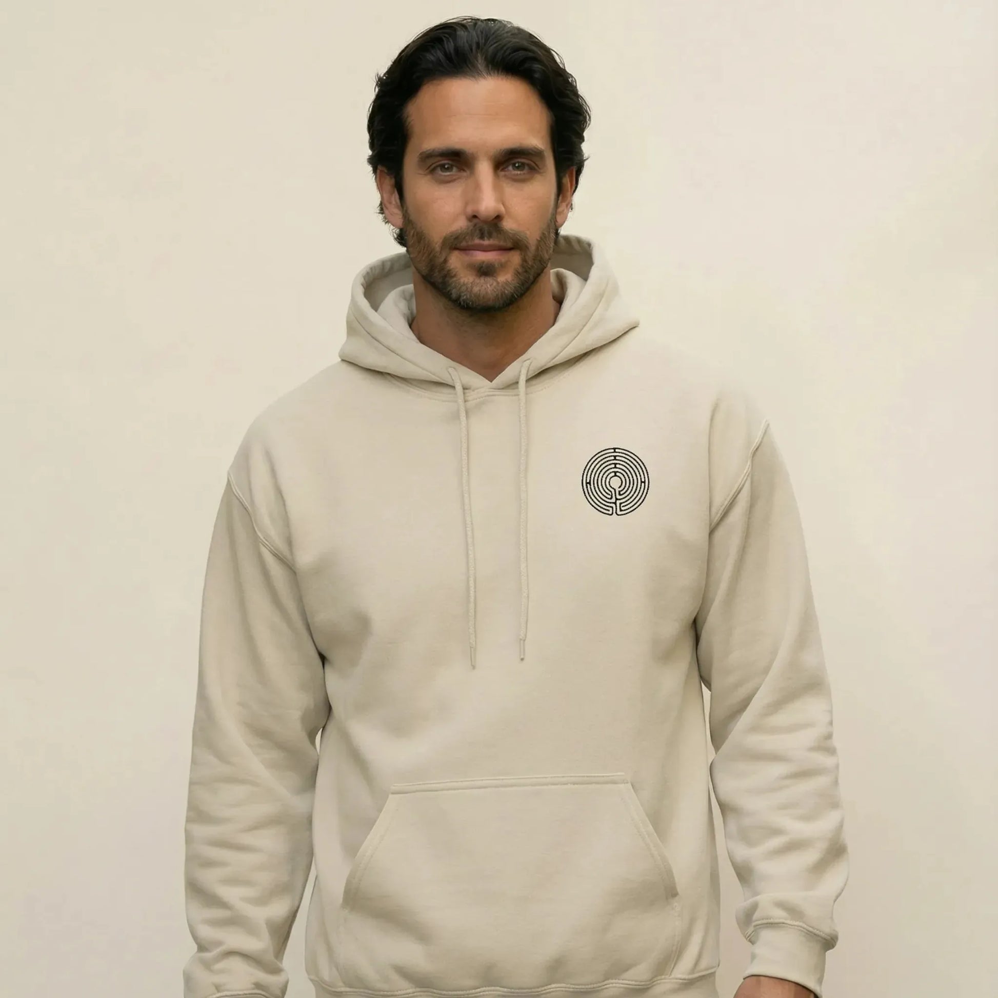 TP:HERO Front view of Labyrinth Hoodie with small circular labyrinth chest glyph