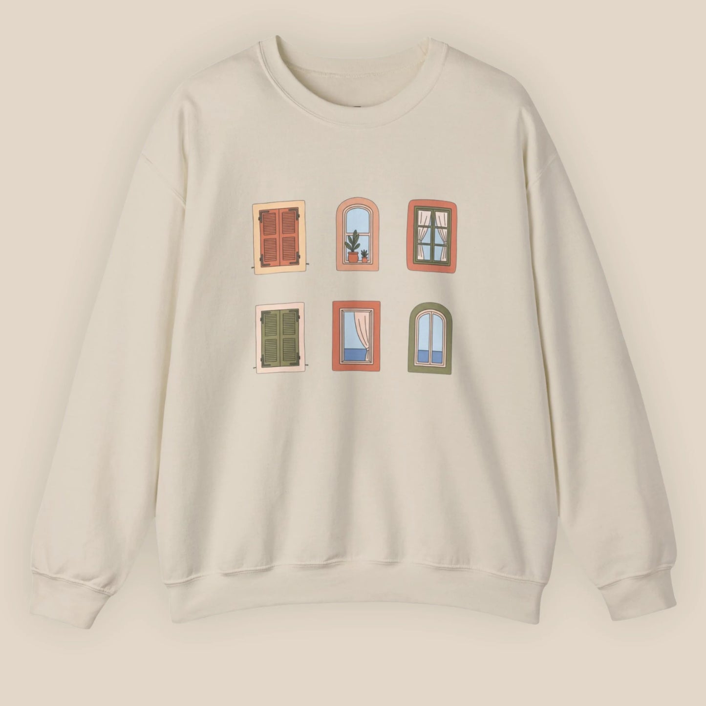 Beige sweatshirt with window illustrations on a beige background