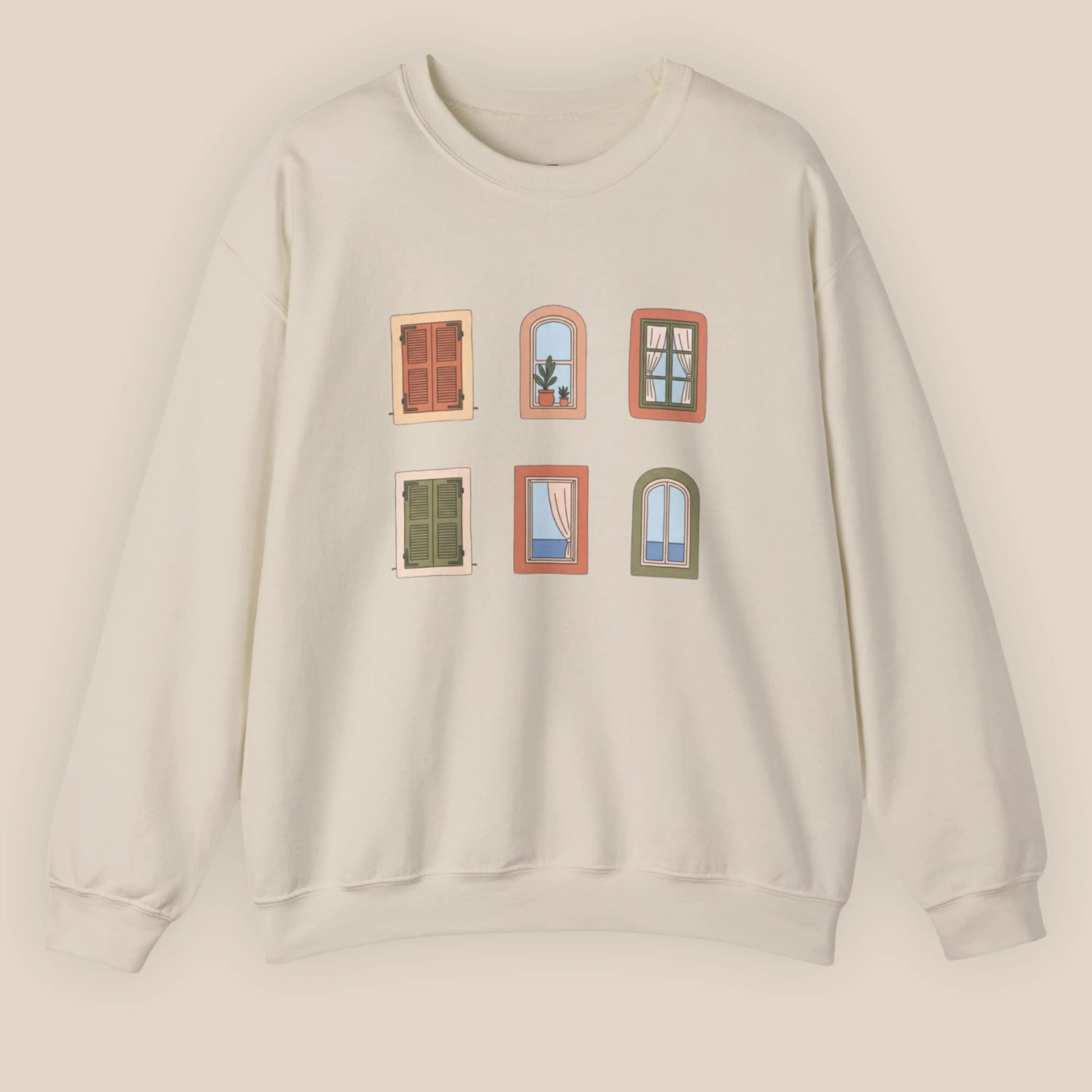 Beige sweatshirt with window illustrations on a beige background