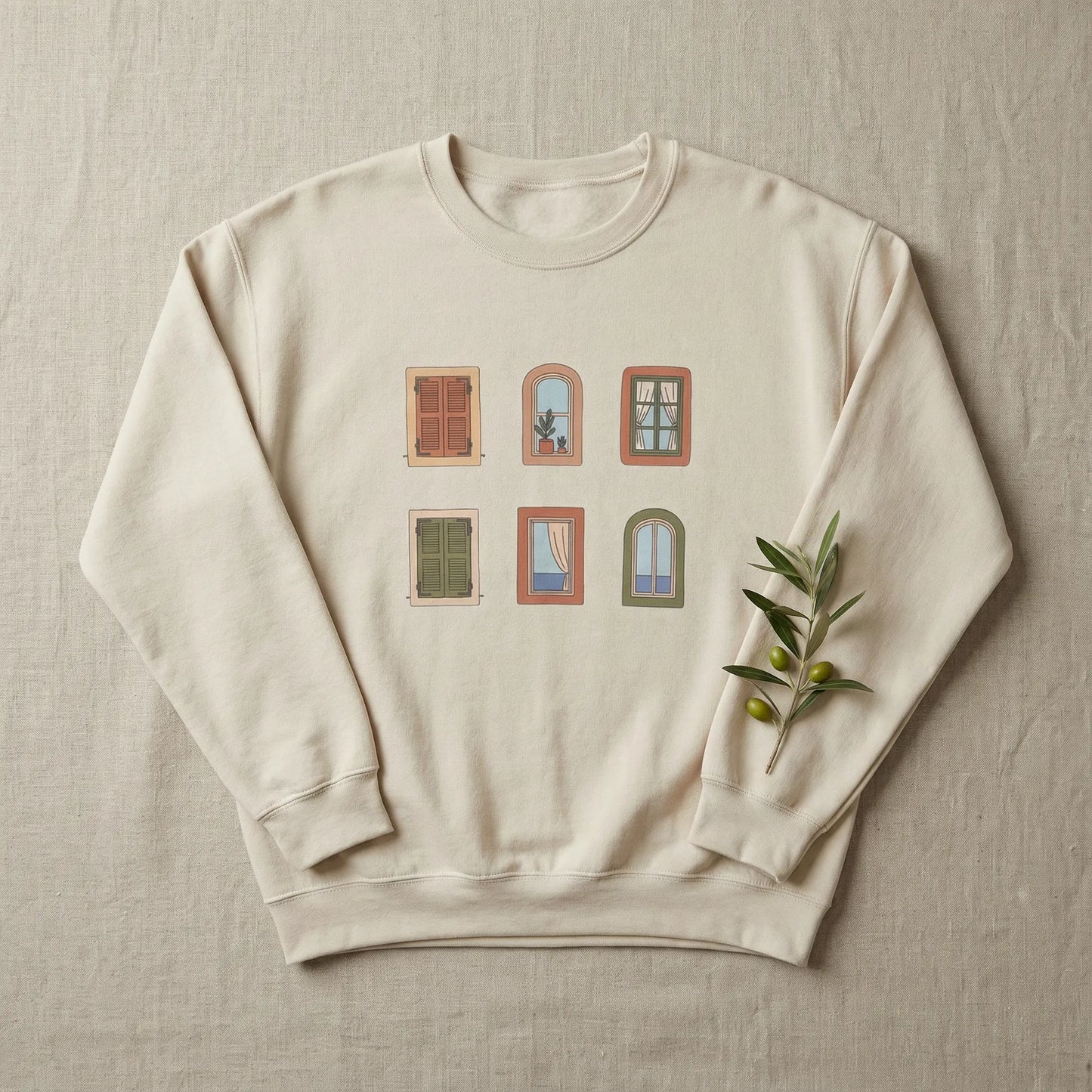 Beige sweatshirt with window design and olive branch on a beige background
