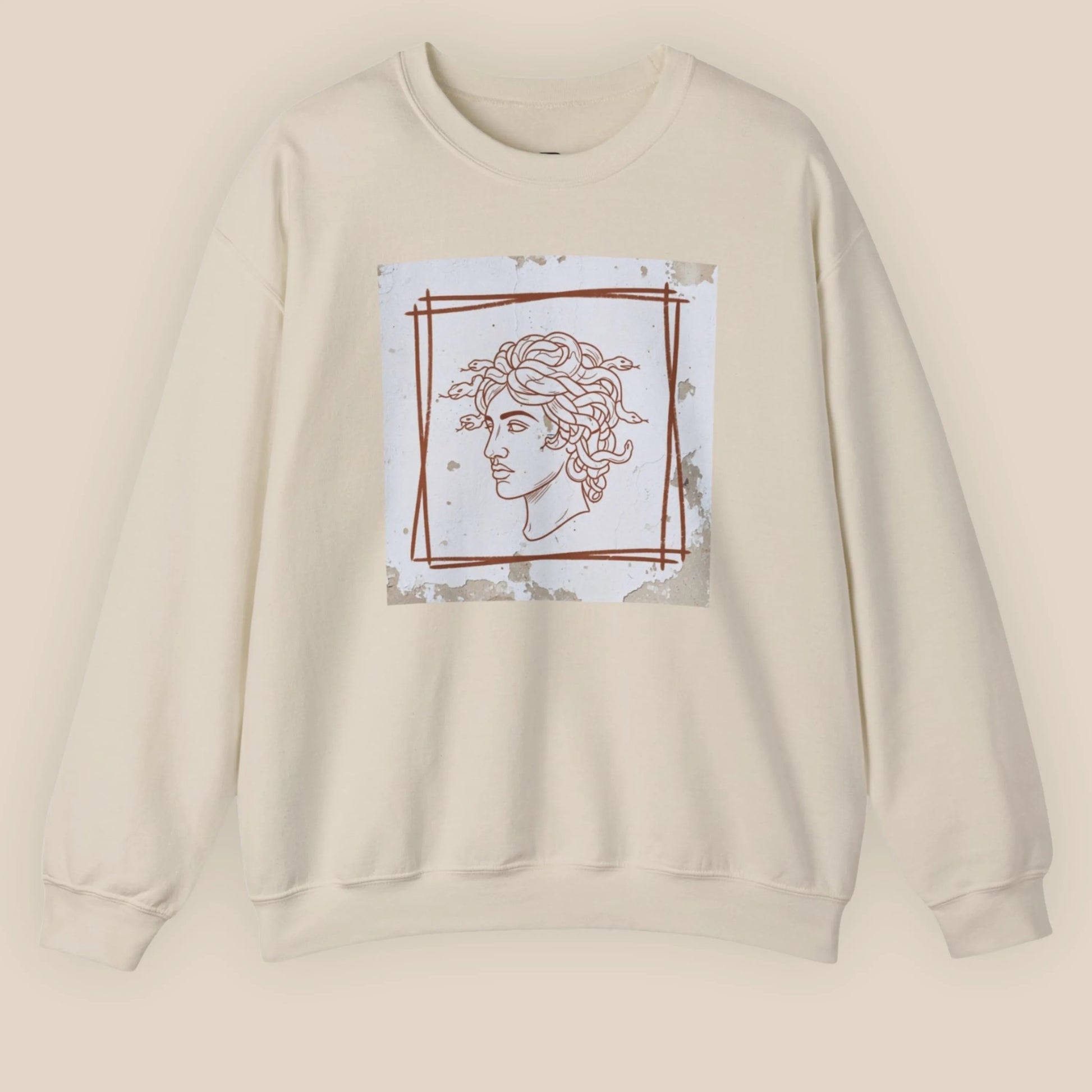 Flat lay of Sand unisex crewneck showing full Minimal Medusa front DTG print